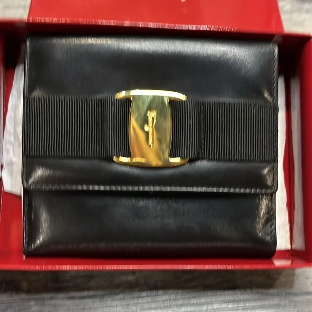 Ferragamo Vara Bifold Wallet Gold ($550) ✨ professionally cleaned and relined ✨